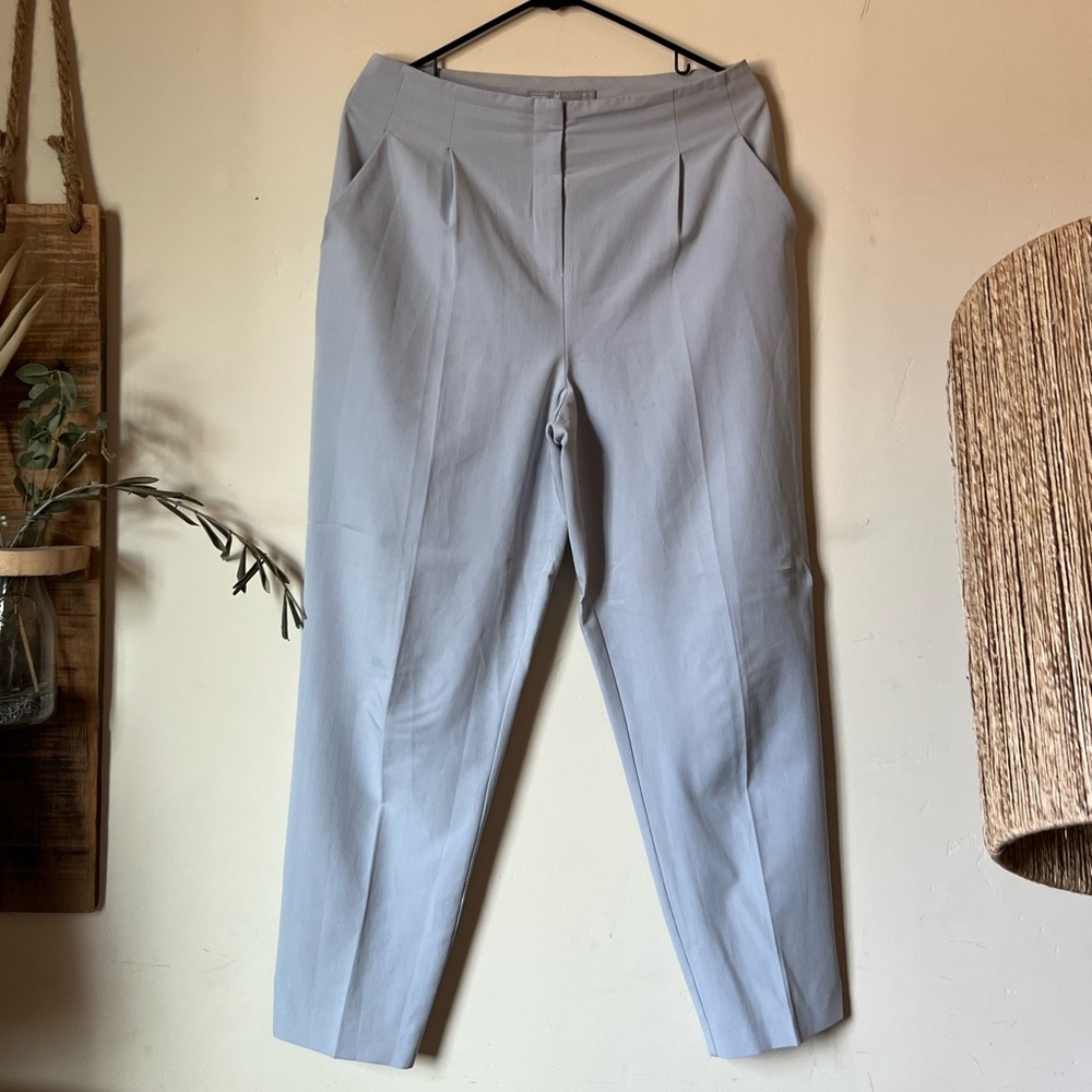 Light blue suit style pants. High waisted.